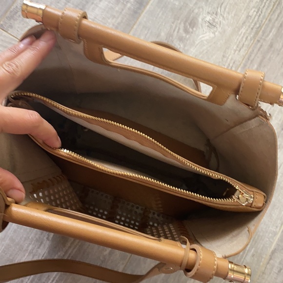 Non brand tan purse with cute detail.  Shows wear inside pocket. - Picture 3 of 5